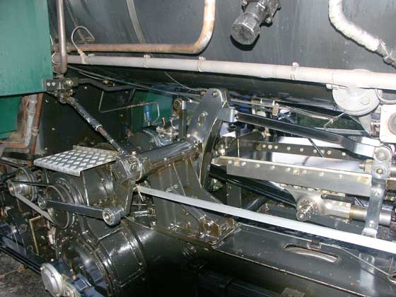This view shows some of the motion, including the crosshead and crosshead slipper, expansion link and the drive, via belts and gearing to the alternator on the far left. October 6 2003