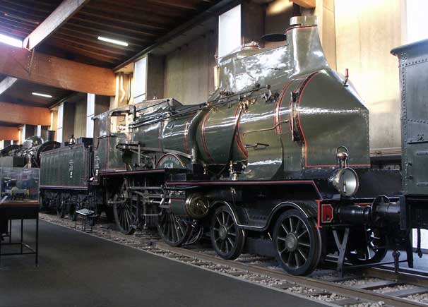 This former PLM "Big C" 4-4-0 C.145 may look odd but the streamlining was for a reason. Strong headwinds on the Rhône valley route were a major hindrance to the operating department. As built the streamlining was a success allowing faster trains to operate over the route under all conditions. For a PLM locomotive these were extremely good. May 30 2003