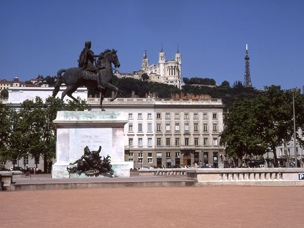 In Place Bellecour there is a monument to Louis XIV - The Sun King - can be nicely lined up for a photo with the basilica Notre-Dame de Fourvière and the Tour métallique de Fourvière.
