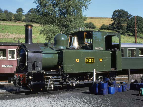 Not all modernised locos have to look different to how they traditionally looked. The fleet of the Welshpool & Llanfair Light Railway is a case in point. Redraughted with a Lempor system concealed within the original chimney, as per the rest of the fleet, this is 823 'Countess' at Llanfair. The redraughting was under taken by Nigel Day & Shaun McMahon. August 14 2003