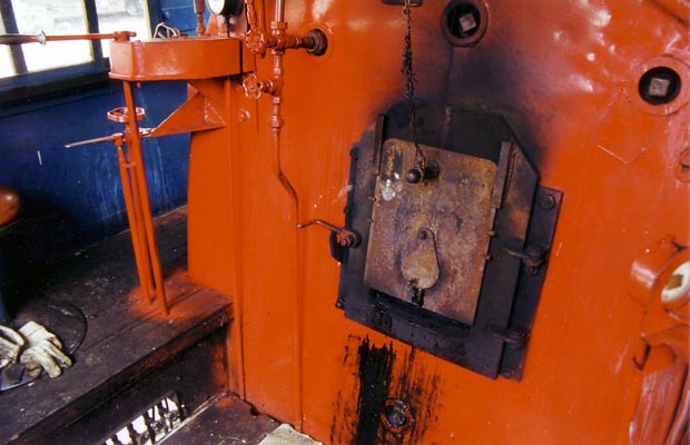 A wider view showing the vertical sliding firehole door and built in floor level ventilation! 1999. © Shaun McMahon