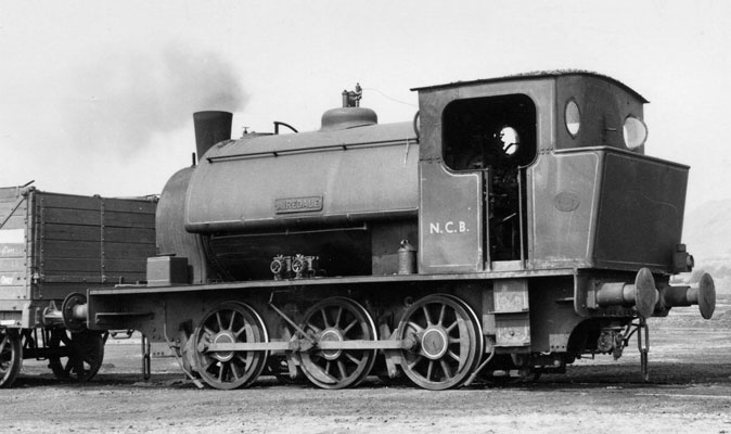 Hunslet No.1440 of 1923. This loco, named 'Airedale' was the very first of what became the standard 15" Hunslet type. Note the underfeed stoker under the bunker. The exposed nature of the parts shows why many locos were fitted with protector plates beneath the coupling hook. This loco is now resident on the Embsay and Bolton Abbey Steam Railway. © Jim Peden, Courtesy of YDRMT