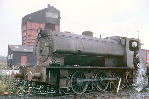 Hunslet No.3212 of 1945. Fitted with a turbo-generator and headlamp the loco is seen, in desperate need of a clean, at North Gawber colliery. July 1969 © G.A.Cryer