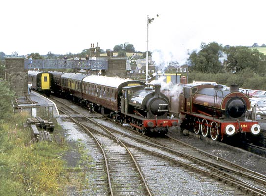 Hunslet No.2705 of 1945, 'Beatrice'. This loco was equipped with a Kylpor exhaust and underfeed stoker but in preservation these have been removed. 'Beatrice' in de-modified form is seen leaving Embsay passing modified Austerity S.134 'Wheldale' (Hunslet 3168 of 1944). August 6 1990