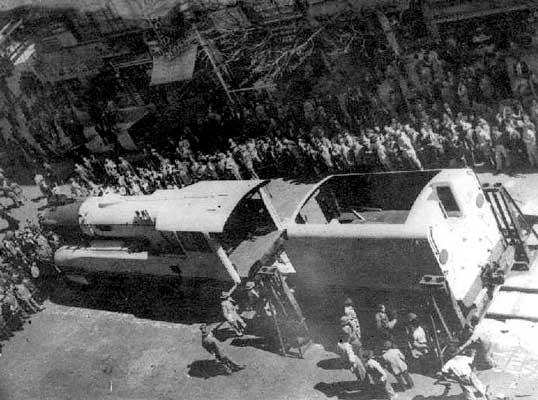 Large crowds witness the preparation for display of 'Argentina'. Note the jacks used for unloading and the roomy cab. 1949