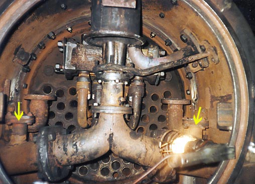 A view of Linda's smokebox with the new nozzle installed. Note that the steam pipes from the superheater header are removed. The two items pointed to by the yellow arrows are a hang over from the days when the loco was a gas producer. These carried exhaust steam for use as clinker control steam at the grate. &copy; Nigel Day