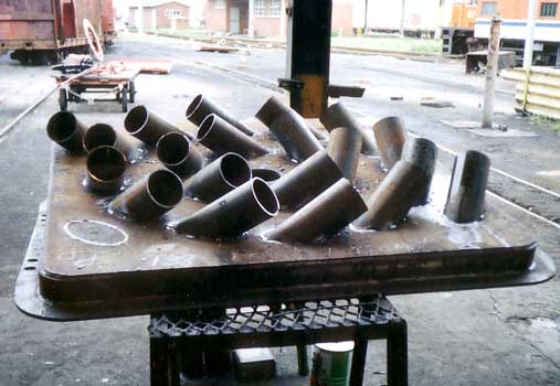 The oil firing pan plate for one of the WHR NGG16s partially complete at Port Shepstone. The air intakes are arranged to induce a swirl effect. &copy; Shaun McMahon