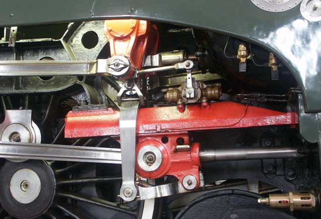 A close up view of the crosshead arrangement and certain items of the valve gear on the right hand side of 232U1. Also note the large brass pressure relief valve on the cylinder end cover. May 30 2003