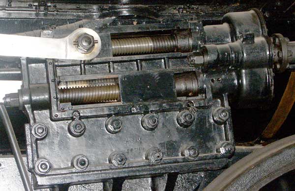 This interesting gearbox operates the valvegear. The driver turns the rod coming in from the right. The upper worm controls the setting of the outside valvegear and the lower worm the inside valvegear. October 9 2003 
