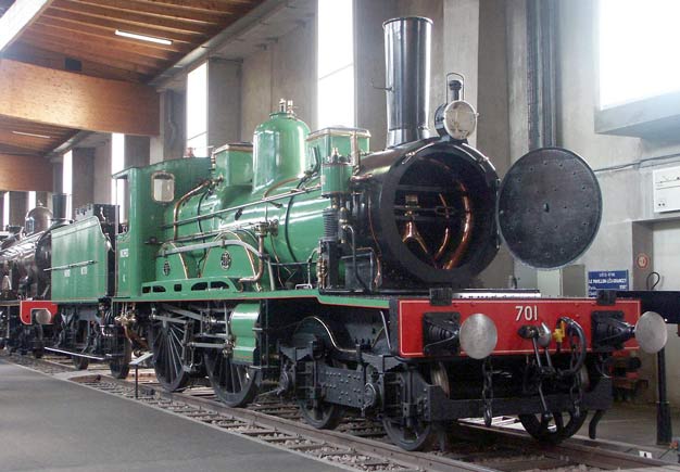 Alfred De Glehn's first compound - Nord Railway 4-2-2-0 No.701 built in 1895. The locomotive is a four cylinder compound with the high pressure cylinders on the inside and the low pressure cylinders outside the frames. The high pressure cylinders drive the leading driving wheels whilst the low pressure cylinders drive the trailing driving wheel. However unlike most other locomotives built the two sets of driven wheels were not linked with coupling rods and hence the wheel arrangement quoted. October 9 2003