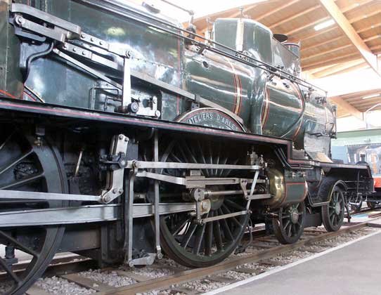 PLM C.145 has an interesting arrangement of Walschaerts valve gear and a very long piston rod ! Also visible are the two reach rods required for the independent valvegears on the high and low pressure sides. October 9 2003 