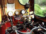 For those on broadband, or faster, internet connections here is a silent video taken on the footplate of Camila. The locomotive was climbing Macarena bank with a seven coach train. Shaun McMahon is at the controls. Note the loco is single manned with all the frequently used controls conveniently grouped together. Also note the use of full regulator with a relatively short cut off. 
