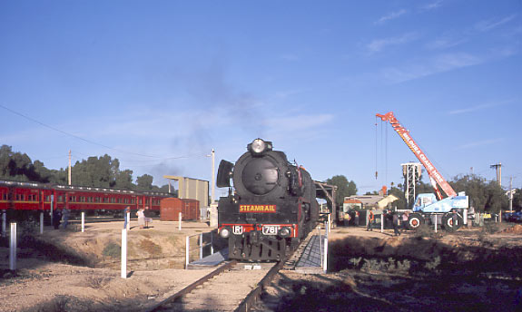 R761 on Mildura turntable ready to be coaled with the aid of that crane. April 26 2002