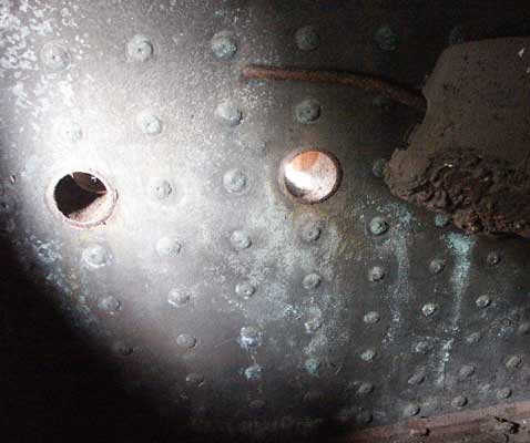 Two of the three overfire air holes for the GPCS in the left handside of the firebox on RSH No. 7289. April 13 2003