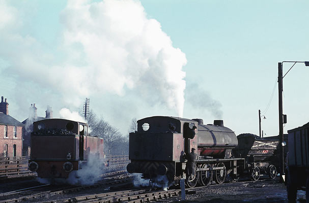 Hudswell Clarke No.1763 of 1944 (on the right) with No.1822 of 1949 on the left at Peckfield Colliery. No.1763 was one of the Austerity types bought by Hunslet, rebuilt, given a Hunslet works number and sold back into industrial service. No.1763 became Hunslet No.3891 of 1965. 19 January 1971 © Geoff Plumb